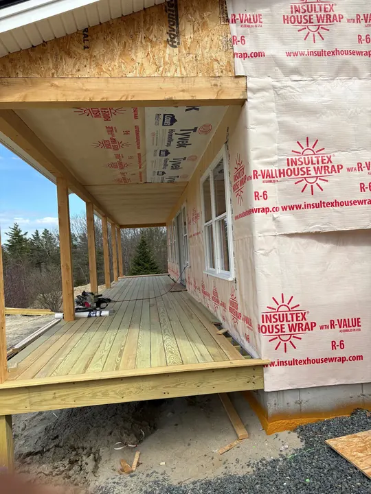 Covered porch with new decking installed